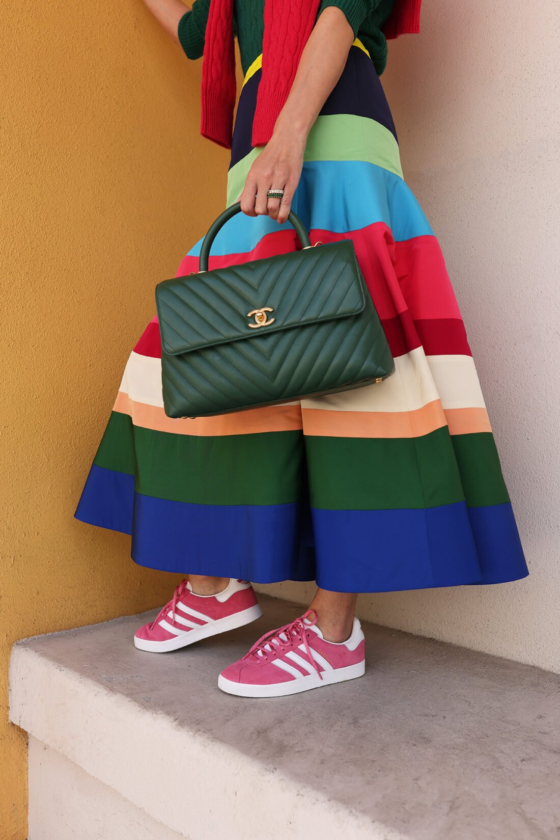 pink adidas gazelle sneakers, green chanel bag
